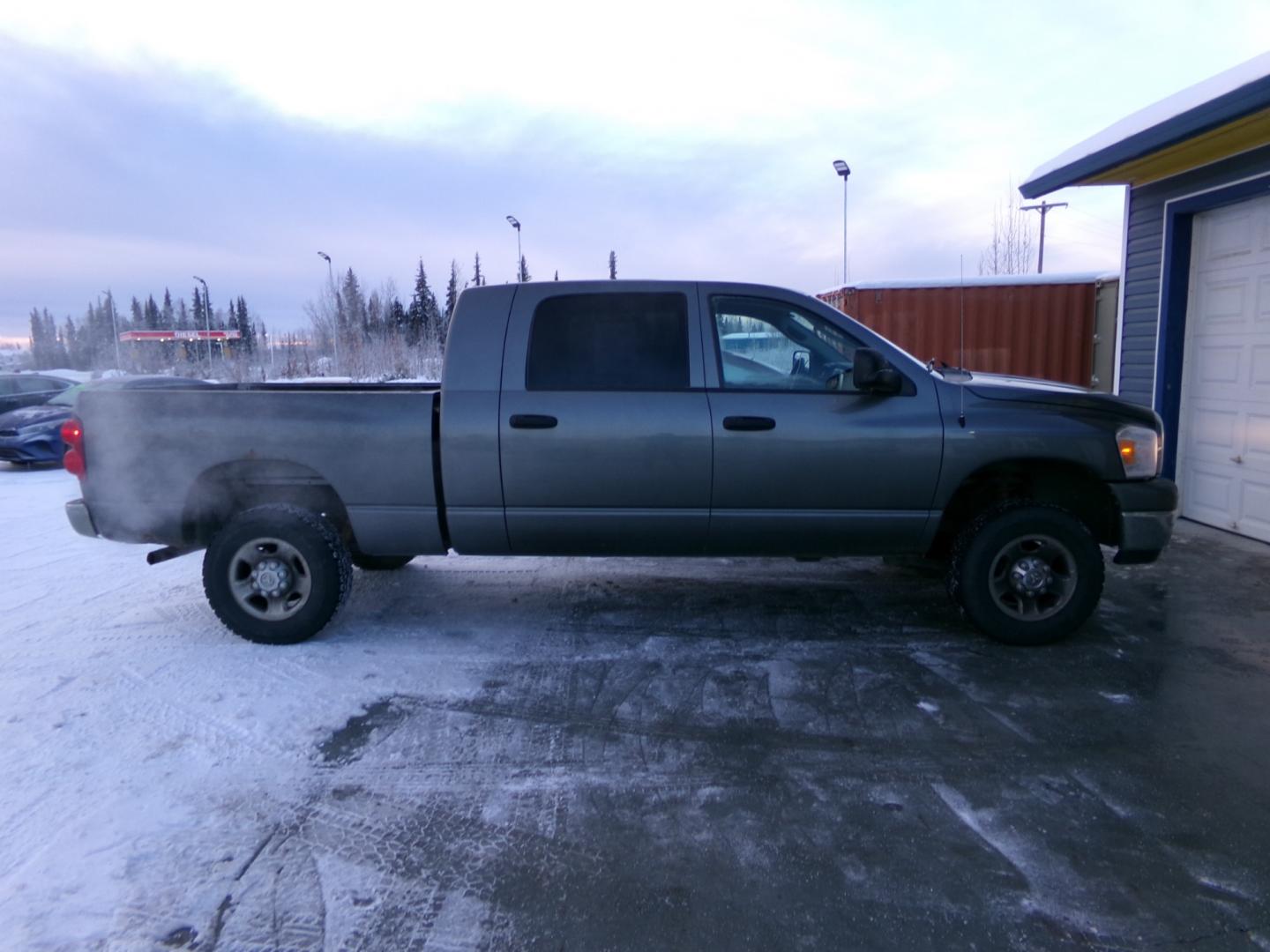 2007 Grey Dodge Ram 1500 Laramie Mega Cab 4WD (3D7KS19D07G) with an 5.7L V8 OHV 16V engine, 5-Speed Automatic Overdrive transmission, located at 2630 Philips Field Rd., Fairbanks, AK, 99709, (907) 458-0593, 64.848068, -147.780609 - Photo#2